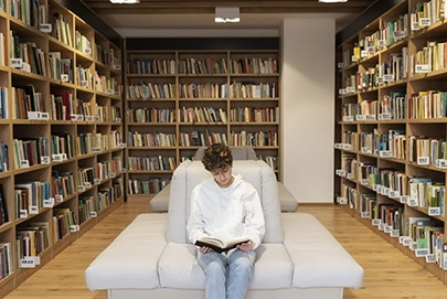 young student earning library